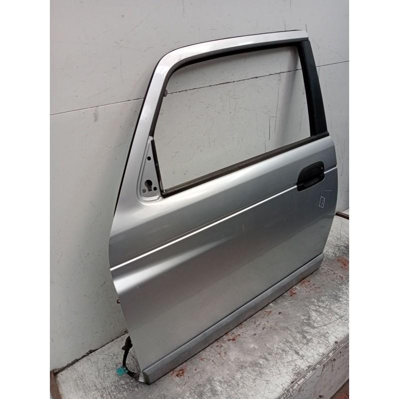 Recambio de puerta delantera izquierda para ssangyong korando (kj) 2.9 td referencia OEM IAM   