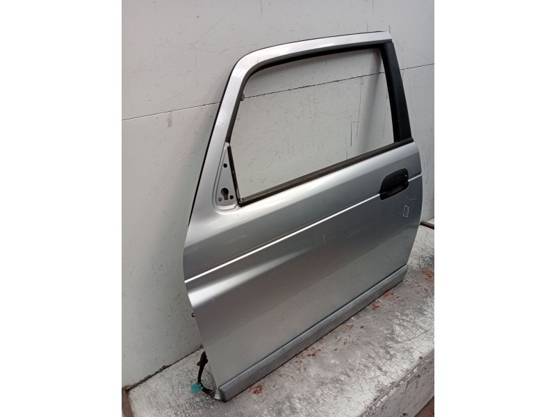 Recambio de puerta delantera izquierda para ssangyong korando (kj) 2.9 td referencia OEM IAM   