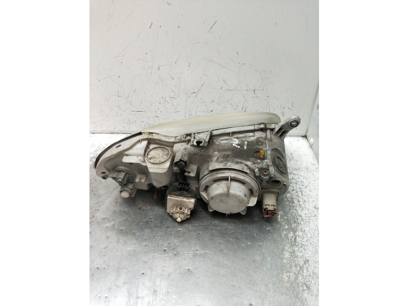 Recambio de faro izquierdo para kia sephia sedán (fa) 1.5 i referencia OEM IAM   1996