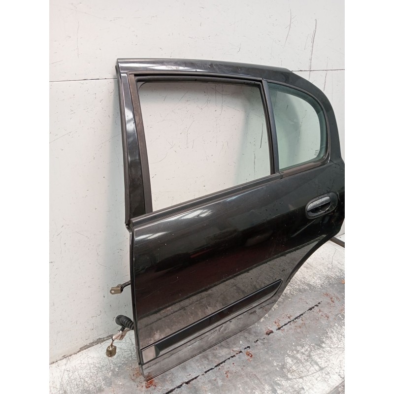 Recambio de puerta trasera izquierda para nissan almera ii hatchback (n16) 2.2 dci referencia OEM IAM  5P 2002