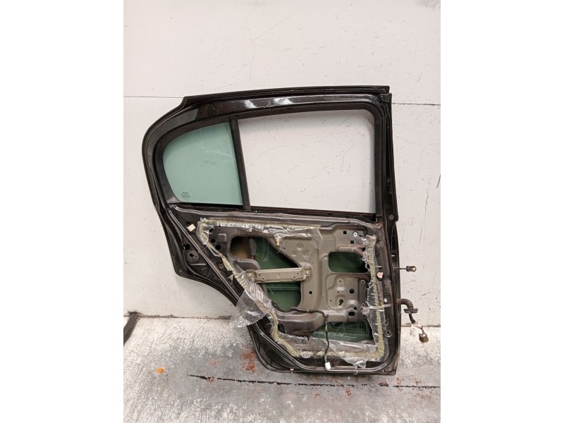 Recambio de puerta trasera izquierda para nissan almera ii hatchback (n16) 2.2 dci referencia OEM IAM  5P 2002