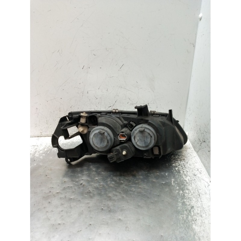 Recambio de faro izquierdo para nissan almera ii hatchback (n16) 2.2 di referencia OEM IAM 89004856 26060BN011 2000