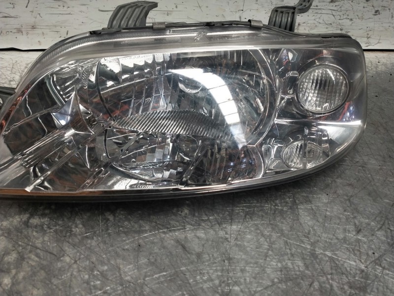 Recambio de faro izquierdo para daewoo kalos 1.4 cat referencia OEM IAM 02201215  