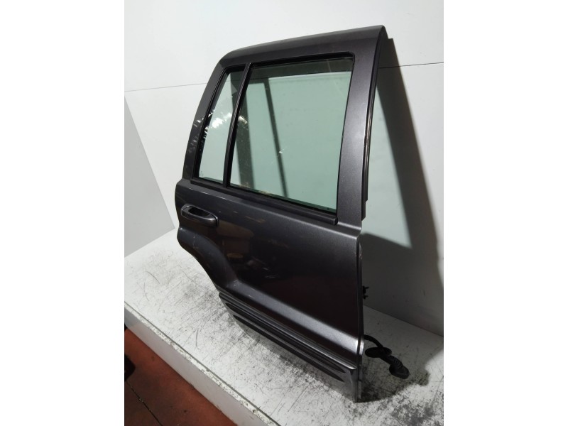 Recambio de puerta trasera derecha para jeep gr.cherokee (wj/wg) 2.7 crd laredo referencia OEM IAM   5P