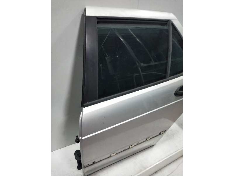 Recambio de puerta trasera izquierda para saab 9-5 familiar 2.3 cat referencia OEM IAM   