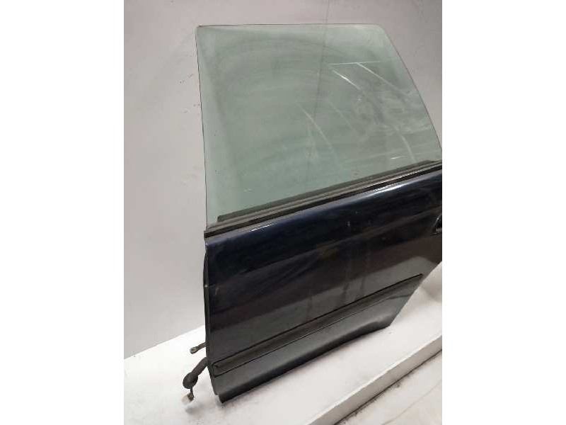 Recambio de puerta trasera izquierda para subaru legacy berl./familiar b11 (bd/bg) 2.2 cat referencia OEM IAM   