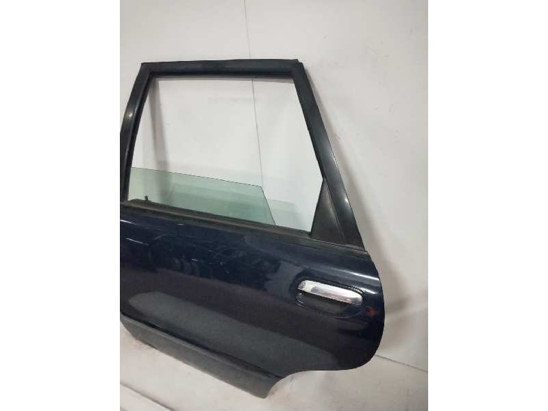 Recambio de puerta trasera izquierda para volvo v40 familiar 1.9 diesel cat referencia OEM IAM   