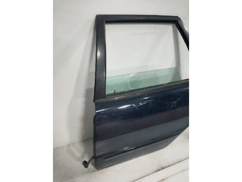 Recambio de puerta trasera izquierda para volvo v40 familiar 1.9 diesel cat referencia OEM IAM   