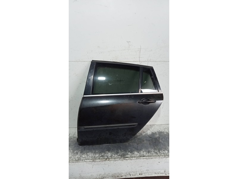 Recambio de puerta trasera izquierda para renault laguna grandtour iii 2.0 dci referencia OEM IAM  RANCHERA 5P