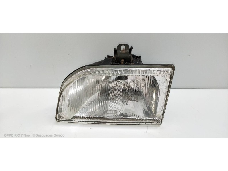Recambio de faro izquierdo para ford fiesta courier familiar referencia OEM IAM   