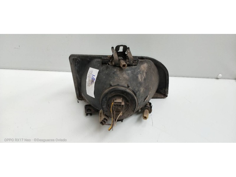 Recambio de faro izquierdo para ford fiesta courier familiar referencia OEM IAM   