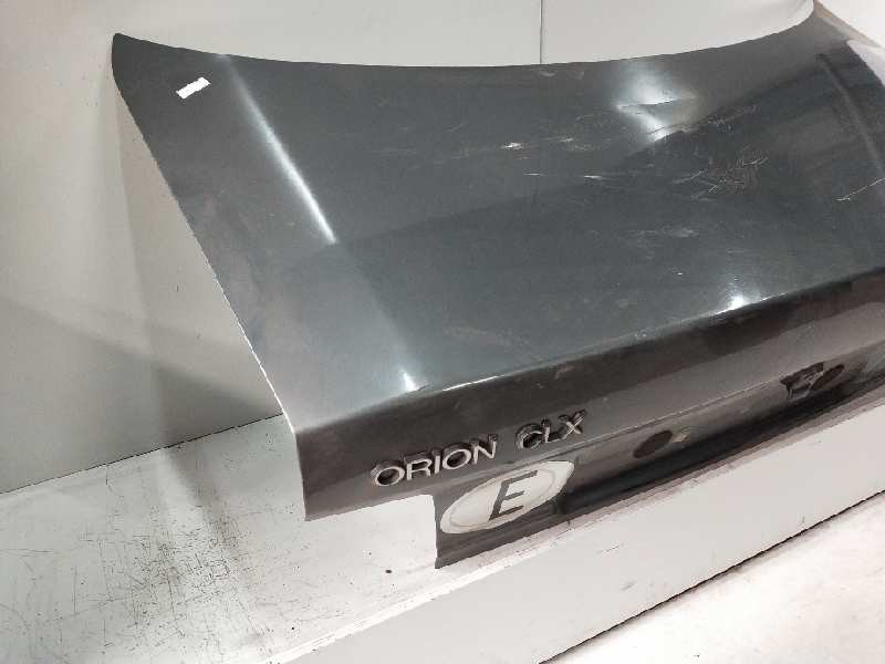 Recambio de tapa maletero para ford orion 1.8 16v cat referencia OEM IAM   