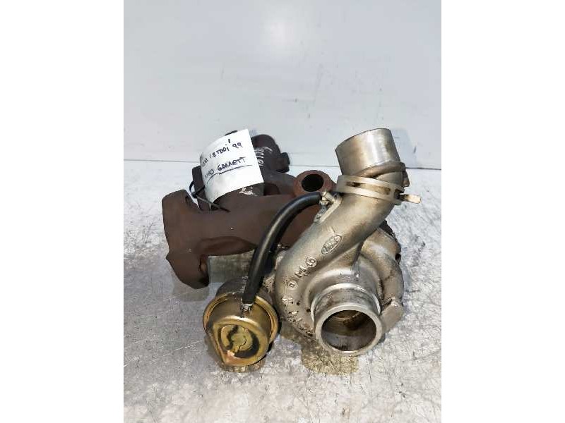 Recambio de turbocompresor para ford fiesta berlina (dx) 1.8 tddi turbodiesel cat referencia OEM IAM 7038632 YS6Q6K682BC 