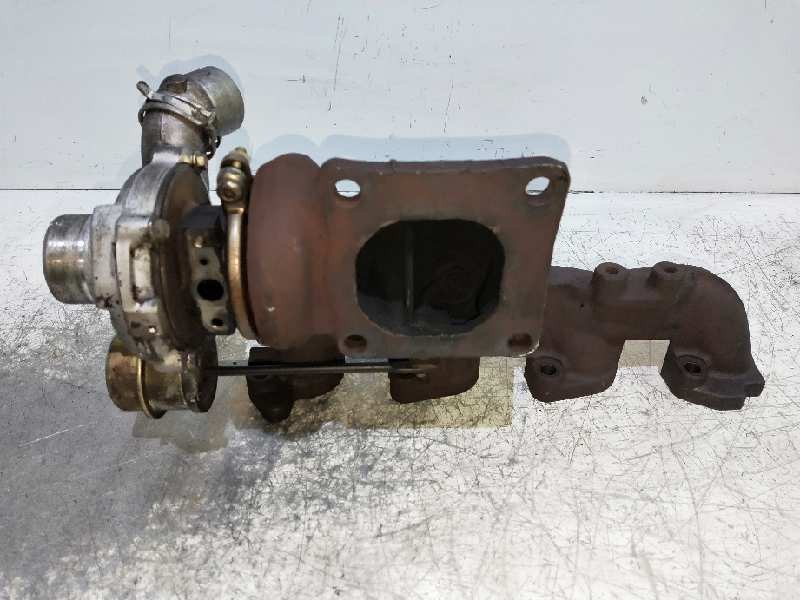 Recambio de turbocompresor para ford fiesta berlina (dx) 1.8 tddi turbodiesel cat referencia OEM IAM 7038632 YS6Q6K682BC 