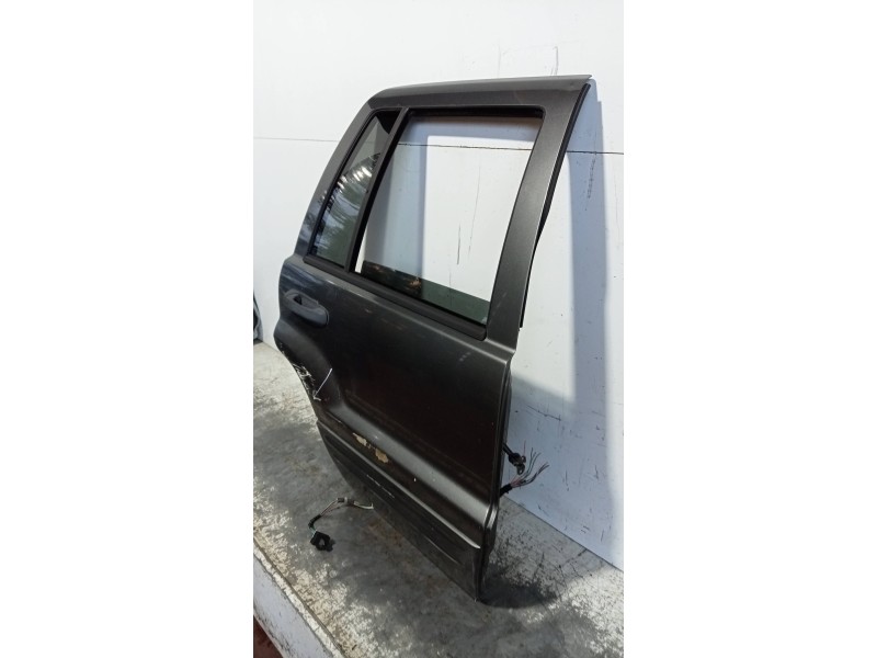 Recambio de puerta trasera derecha para jeep gr.cherokee (wj/wg) 2.7 crd limited referencia OEM IAM   