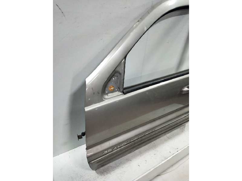 Recambio de puerta delantera izquierda para jeep gr.cherokee (wj/wg) 3.1 td limited referencia OEM IAM  GR CHEROKEE