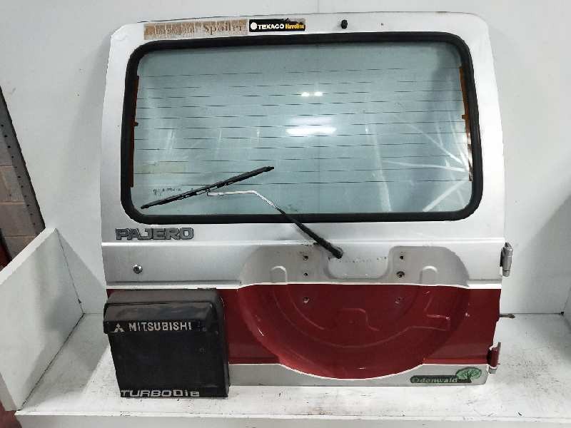Recambio de porton trasero para mitsubishi montero (l040) 2.5 turbodiesel referencia OEM IAM   