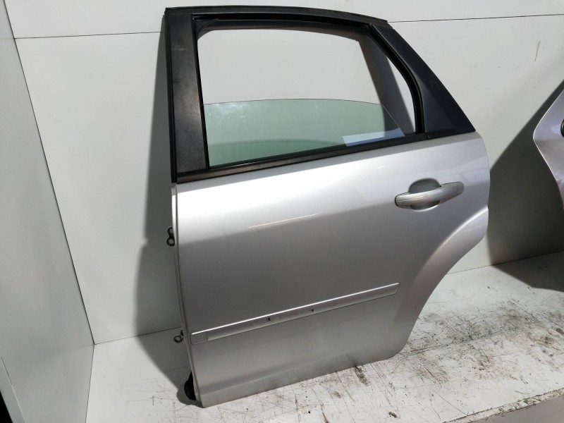 Recambio de puerta trasera izquierda para ford focus berlina (cap) ambiente (d) referencia OEM IAM  5P 
