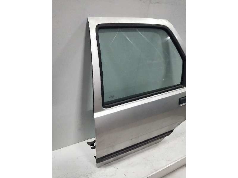 Recambio de puerta trasera izquierda para ford sierra turnier 1.8 turbodiesel referencia OEM IAM  5P 