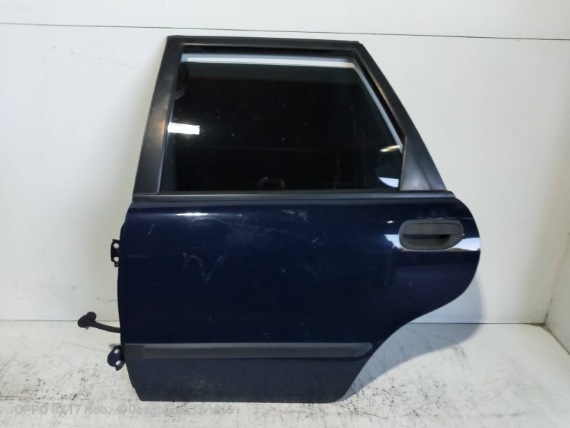 Recambio de puerta trasera izquierda para volvo v40 familiar 1.8 16v referencia OEM IAM  5P 