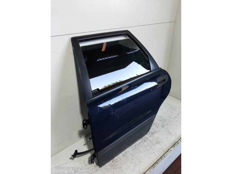 Recambio de puerta trasera izquierda para volvo v40 familiar 1.8 16v referencia OEM IAM  5P 