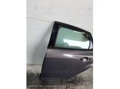 Recambio de puerta trasera izquierda para ford focus lim. 1.6 tdci cat referencia OEM IAM   5P 2