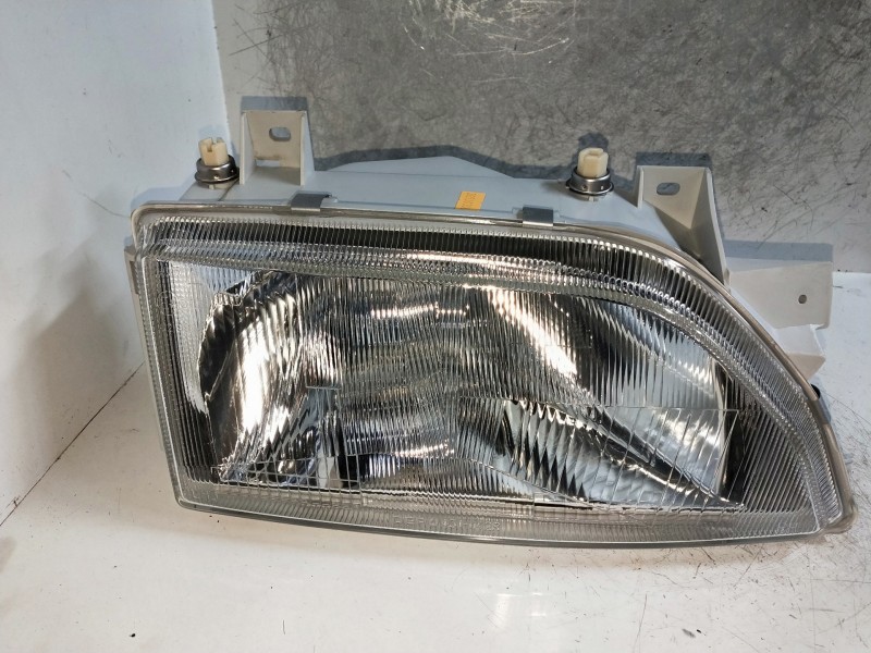 Recambio de faro derecho para ford escort berlina/turnier referencia OEM IAM   