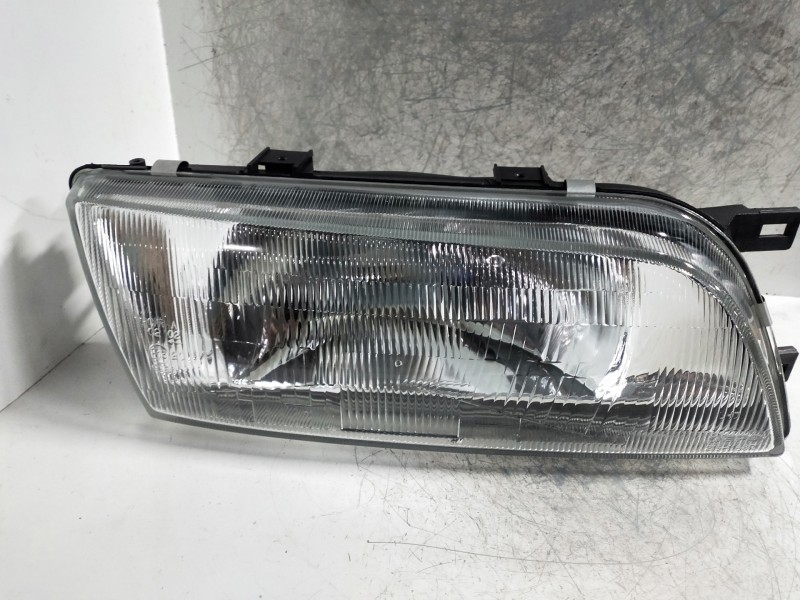 Recambio de faro derecho para nissan almera (n15) referencia OEM IAM    Recambio de faro derecho para nissan almera (n15) referencia OEM IAM