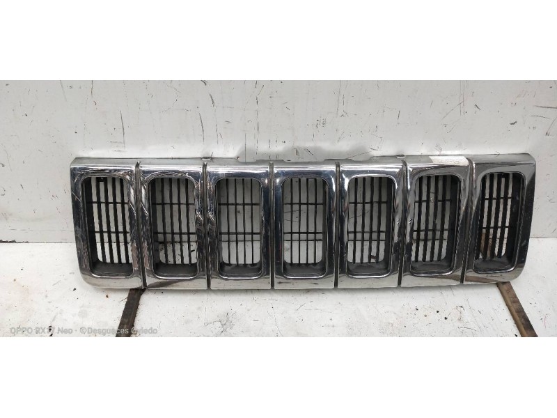 Recambio de rejilla delantera para jeep gr.cherokee (zj)/(z) 2.5 turbodiesel referencia OEM IAM 55055059  