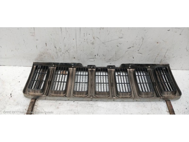 Recambio de rejilla delantera para jeep gr.cherokee (zj)/(z) 2.5 turbodiesel referencia OEM IAM 55055059  