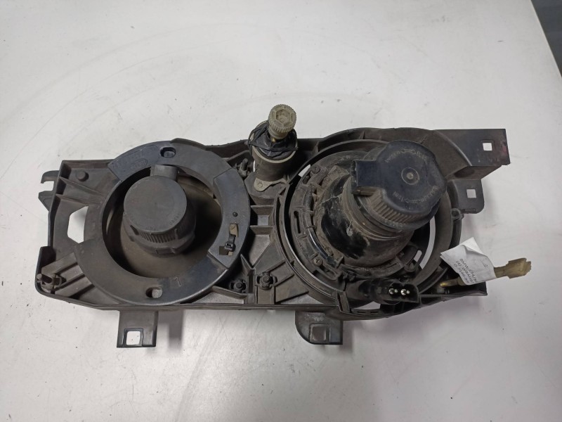 Recambio de faro izquierdo para bmw serie 5 berlina (e34) 520i (110kw) referencia OEM IAM 13174100LI  