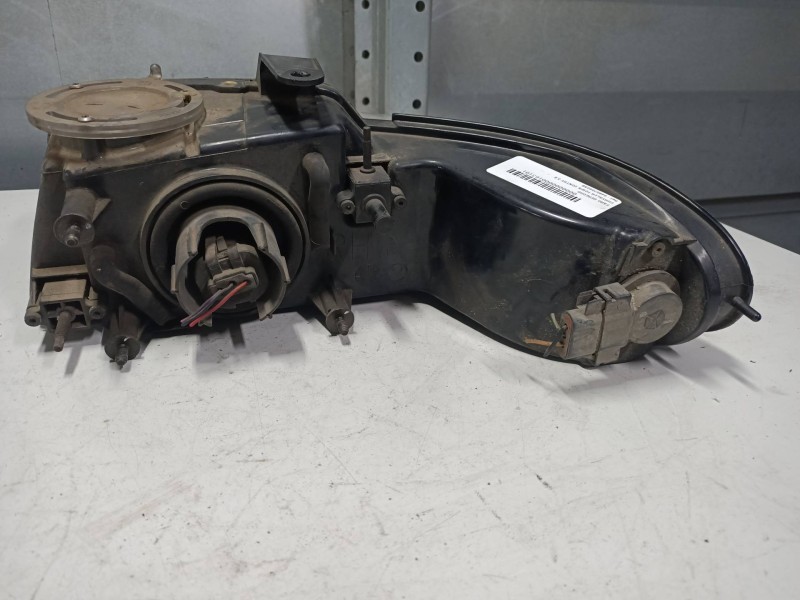 Recambio de faro derecho para chrysler town contry 3.8 referencia OEM IAM 04857040AB  