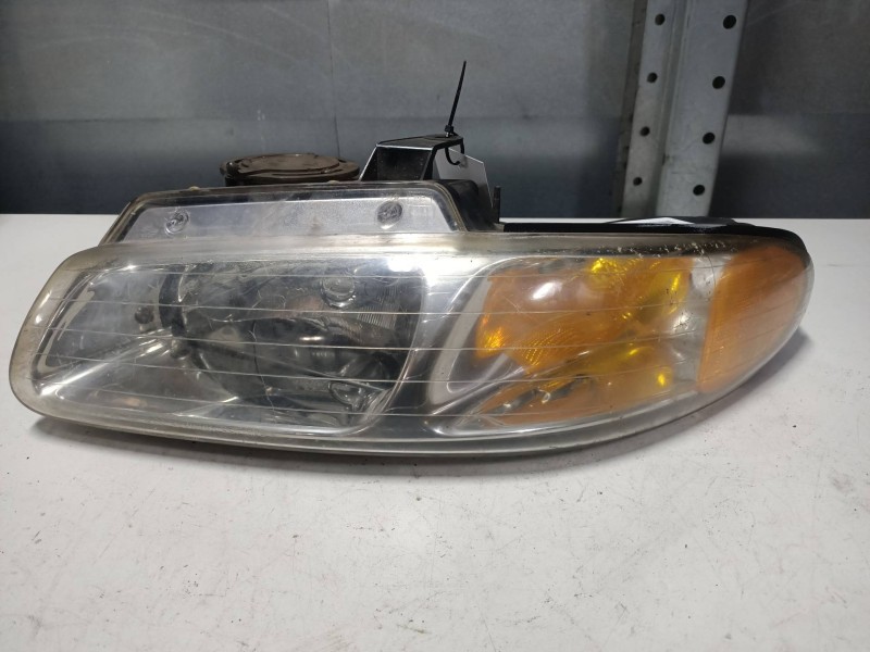 Recambio de faro izquierdo para chrysler town contry 3.8 referencia OEM IAM   