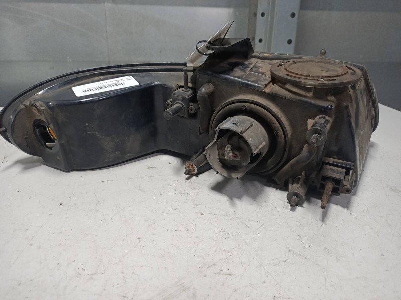 Recambio de faro izquierdo para chrysler town contry 3.8 referencia OEM IAM   