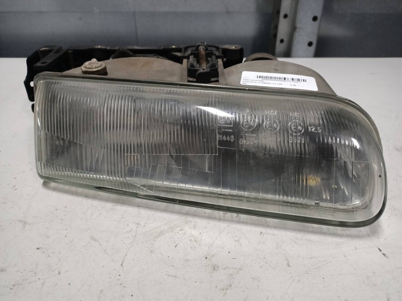 Recambio de faro derecho para chrysler le baron 3.0 cat referencia OEM IAM   