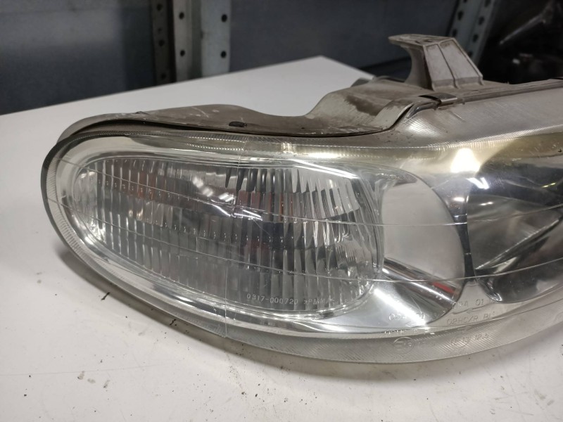 Recambio de faro derecho para daewoo nubira berlina 1.6 cat referencia OEM IAM   