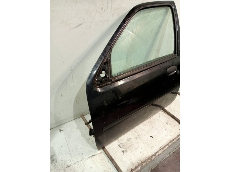 Recambio de puerta delantera izquierda para ford fiesta berlina ghia referencia OEM IAM  5P 