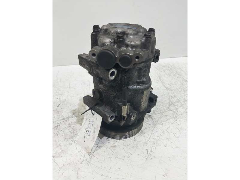 Recambio de compresor aire acondicionado para dacia logan laureate referencia OEM IAM SD7V161061 8200802609 1061