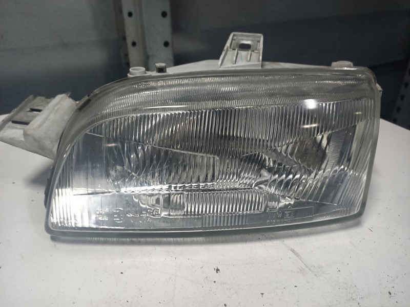 Recambio de faro izquierdo para fiat punto berlina (176) 1.1 referencia OEM IAM 086611111  