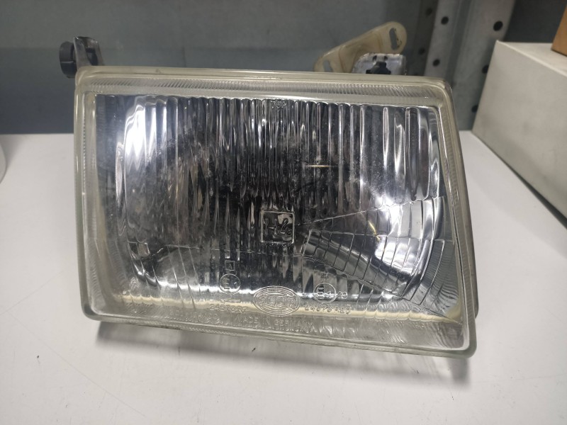Recambio de faro derecho para ford escort berl./turn./cab./express básico berlina referencia OEM IAM   