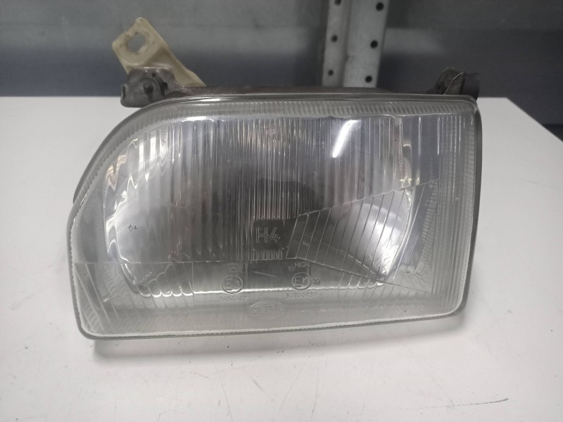 Recambio de faro izquierdo para ford escort berlina 1.8 diesel referencia OEM IAM    Recambio de faro izquierdo para ford escort berlina 1.8 diesel referencia OEM IAM
