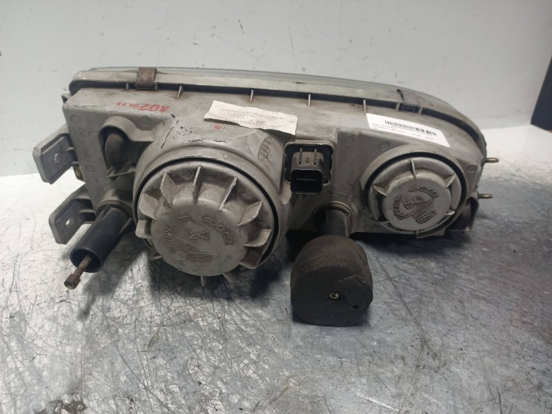 Recambio de faro izquierdo para hyundai h 100 2.5 d referencia OEM IAM   