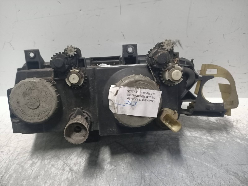 Recambio de faro derecho para lancia delta 1.4 cat referencia OEM IAM   