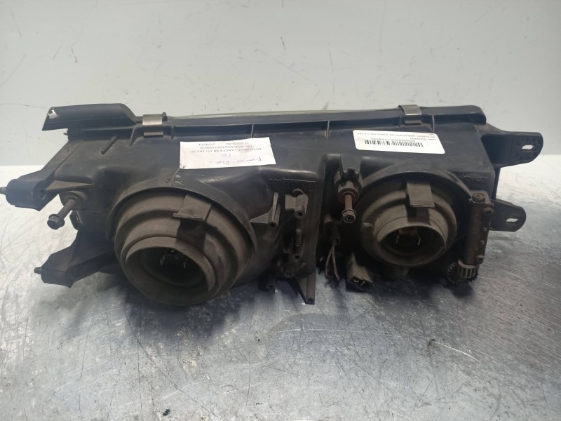 Recambio de faro izquierdo para mitsubishi lancer berlina (c60a/c70a) 1.5 cat referencia OEM IAM   