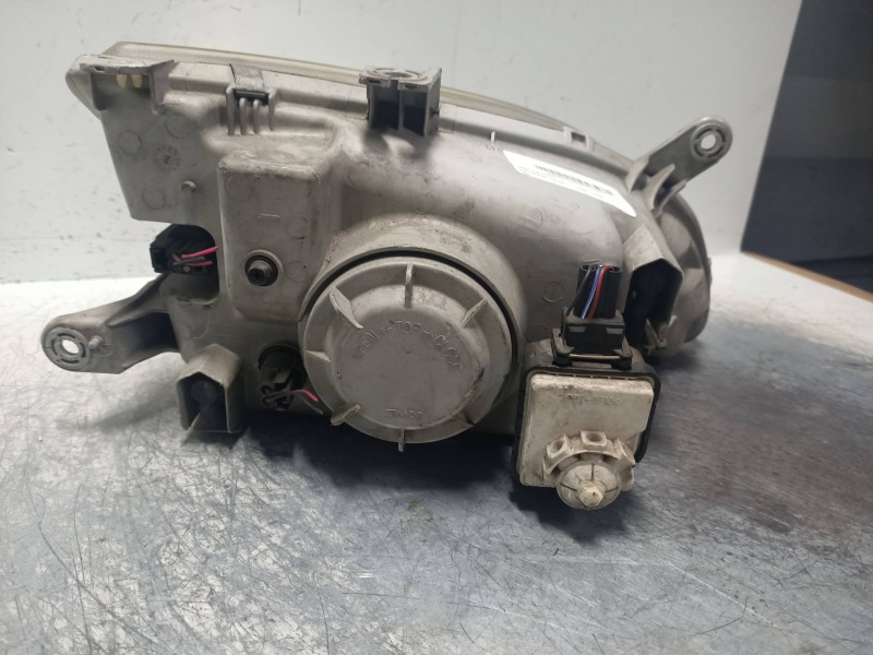 Recambio de faro izquierdo para kia carens 1.8 cat referencia OEM IAM   