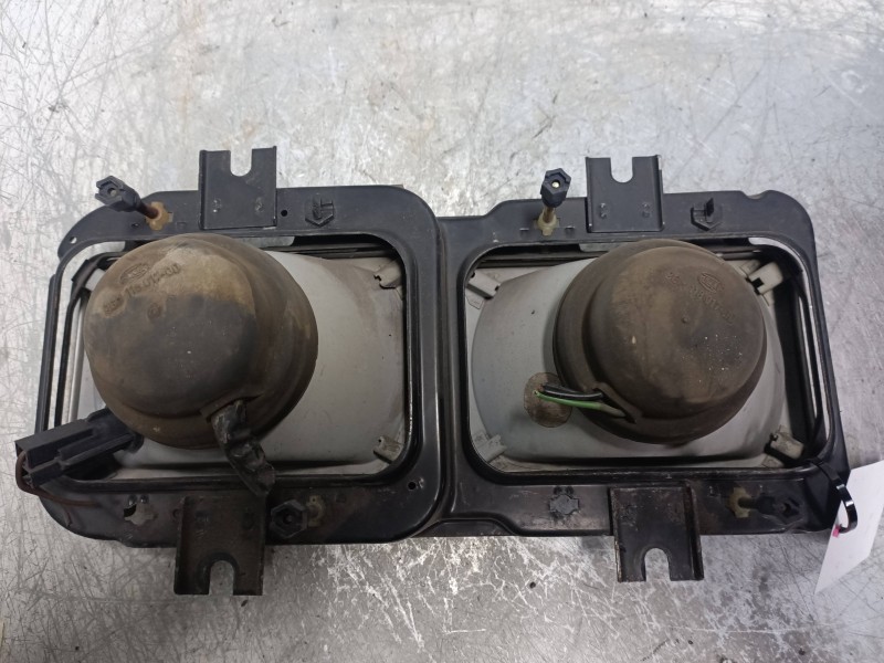 Recambio de faro izquierdo para nissan m-125 td referencia OEM IAM   