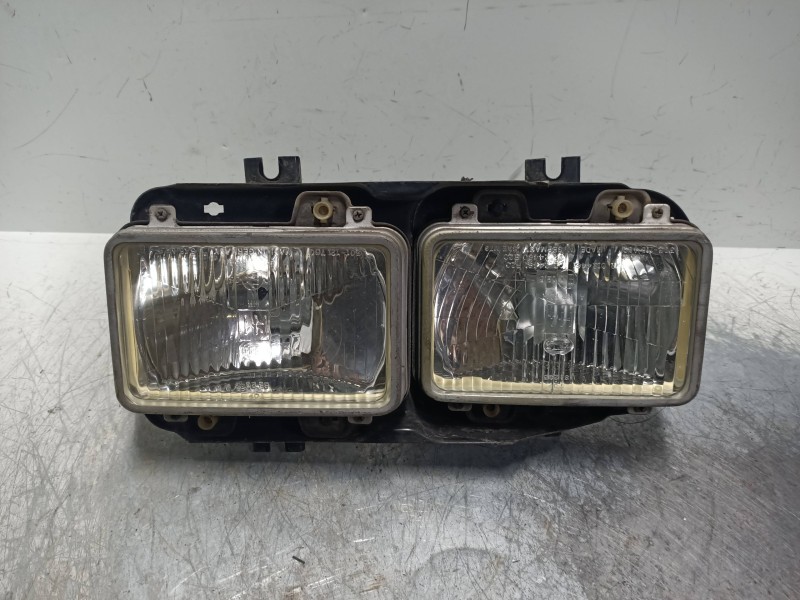 Recambio de faro derecho para nissan m-125 td referencia OEM IAM   