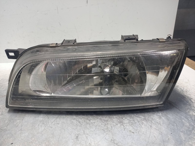 Recambio de faro izquierdo para nissan almera (n15) gx referencia OEM IAM   