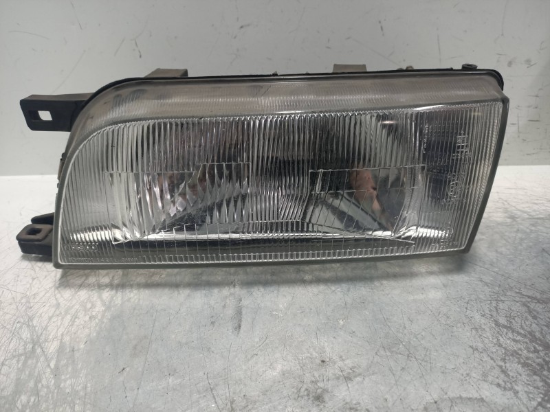 Recambio de faro izquierdo para nissan sunny berlina (n14) 2.0 diesel referencia OEM IAM   