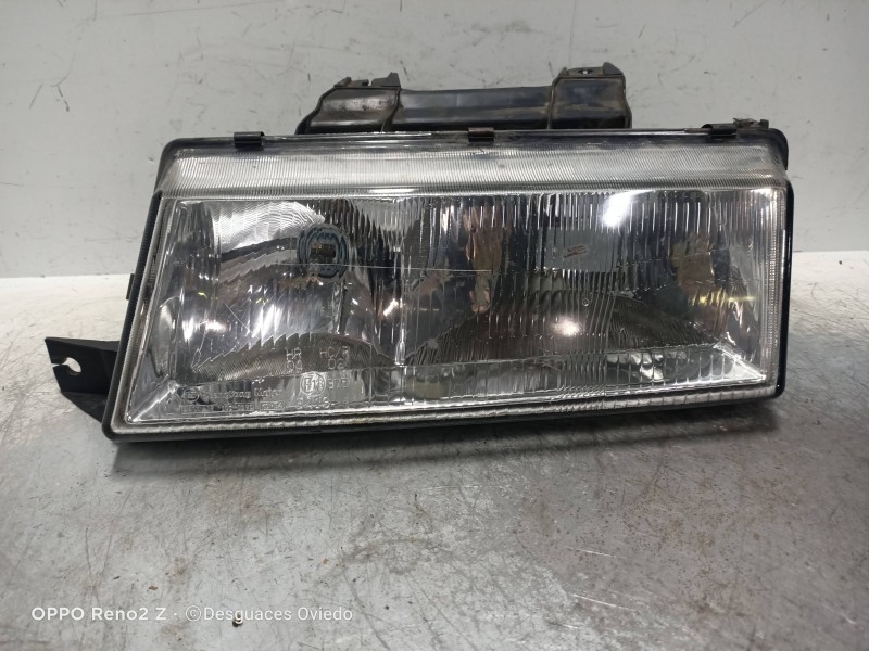 Recambio de faro izquierdo para ssangyong musso referencia OEM IAM   